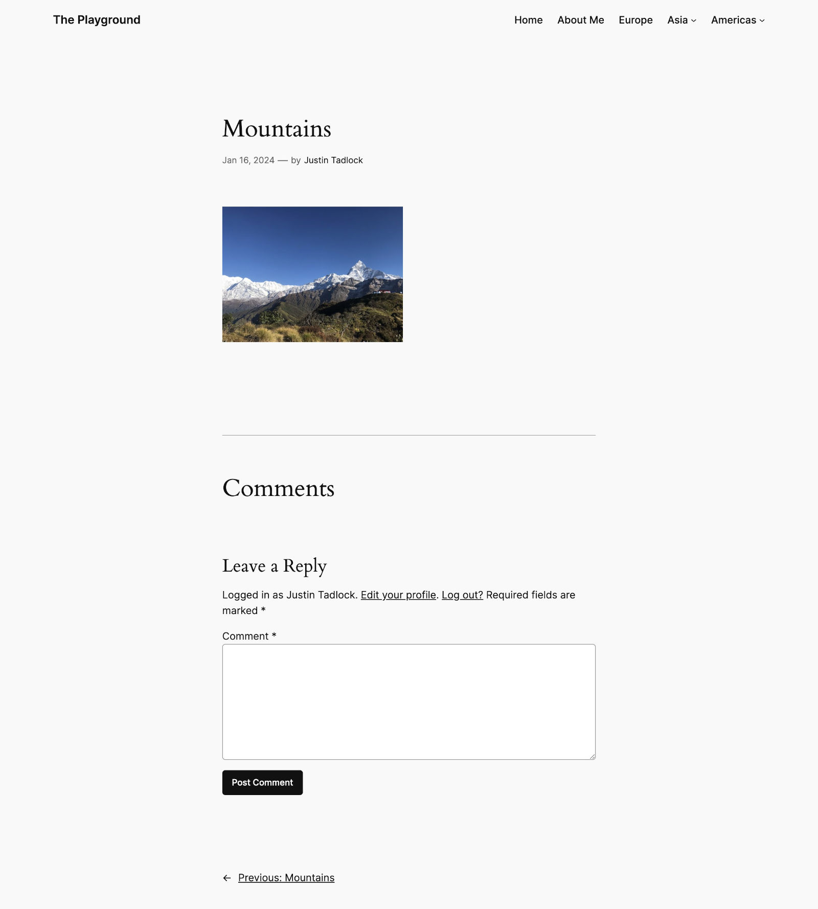 Screenshot of an image attachment page that shows a thumbnail of mountains.